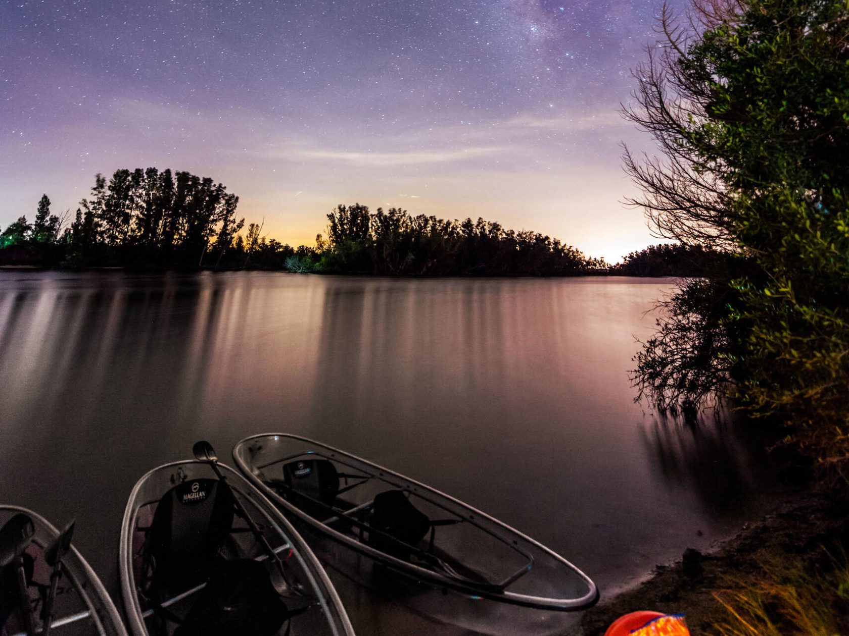 a sunset over a body of water