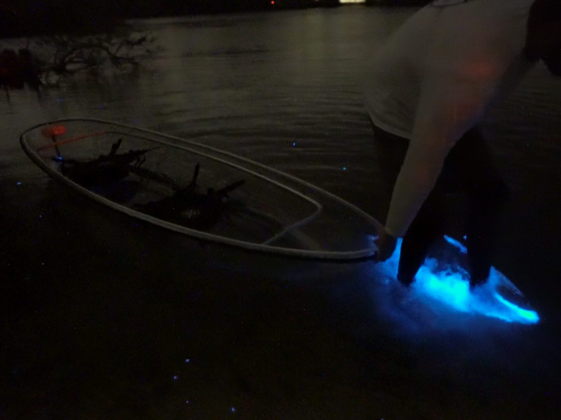 a person that is standing in the dark